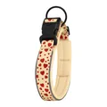 Gros plan d'un collier pour chien réfléchissant avec motifs cœurs rouges et doublure. - S / Cœur Jaune