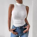 Close-up detail of a stylish white slim-fit sleeveless mesh jacquard knit crop top for women. - S / Tops / White
