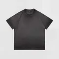Camiseta vintage de algodón gris carbón lavado con acabado desgastado para unisex - S / Tops / Negro Degradado