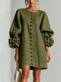 Close-up detail of olive green cotton linen dress with 3D flower lantern sleeves - Green