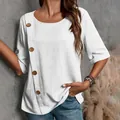 Dettaglio camicetta bianca in cotone e lino con bottoni decorativi in legno - Taglia S / Top / Bianco