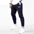 Men's professional black slim fit sports joggers with drawstring waist and logo print - M / Bottoms / Black
