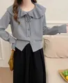 Sweet grey knit cardigan featuring a ruffled doll collar and heart-shaped gold buttons - One Size / Tops / Gray