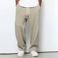 Men's loose beige waffle knit wide-leg sweatpants with drawstring for casual wear - S / Bottoms / Khaki