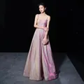 Full view of a shimmering purple evening gown with thin straps and a backless design. - Pink