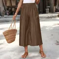 Summer casual wide-leg cropped trousers with pockets in brown, lifestyle street view - Brown