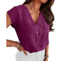 Detailed view of women's purple V-neck sleeveless blouse with textured fabric. - S / Tops / Purple