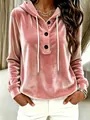 Elegant close-up of a pink velvet hooded sweatshirt featuring drawstrings and button details - Pink