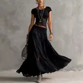 Close-up detail of stylish black lace knit top and flowing chiffon maxi skirt two-piece set - XS / Top And Bottom / Black