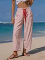 Casual pink striped wide-leg pants with red drawstring on a sunny beach setting - S / Bottoms / Red