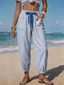 Close-up of blue and white striped women's beach vacation tapered pants with drawstring - S / Bottoms / Blue