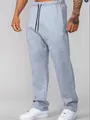 Detail view of men's loose grey cotton-blend joggers for fitness and casual wear - S / Bottoms / Light Gray
