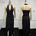 Front and back detail of a black halter neck deep V-neck bohemian summer dress - XS / Dresses / Black