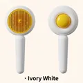 Self-cleaning pet grooming brush with creative poached egg design in ivory white color finish - Bag Packaging / Yellow White