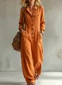 Orange linen jumpsuit with lapel collar and wide legs for a casual vacation look. - Orange Red