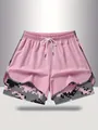 Pink double-layer women's sports shorts with camo inner layer and elastic drawstring waist - Pink
