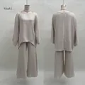 Vue avant et arrière d'un ensemble chemise ample et pantalon large de couleur kaki décontracté. - S / Haut Et Bas / Kaki