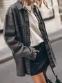 Close-up of vintage oversized grey denim shirt with large pockets and metal buttons - S / Tops / Dark Gray
