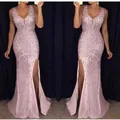 Close-up of elegant pink sequined evening gown with high slit detail - S / Pink