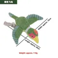 Durable green bird shaped plush dog toy with cotton rope knot for interactive play - Green Flying Bird