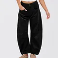 Detailed view of black high-waisted corduroy wide-leg pants showing fabric texture. - Black
