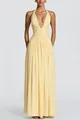 Elegant yellow floor-length maxi dress with deep V-neck and stylish halter strap design - S / Dresses / Yellow