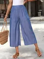 Stylish denim blue wide-leg culottes for women featuring elastic waist and side pockets - S / Bottoms / Light Blue