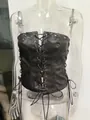 Detail view of a vintage brown PU leather lace-up tube top on a clear mannequin - S / Tops / Black