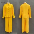 Détail de l'ensemble jaune deux pièces avec chemise à manches longues et pantalon large - S / Haut Et Bas / Jaune