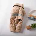 Close-up detail of khaki quilted pet winter coat with plush collar and harness ring - XS / Khaki