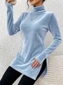 Detailed view of the soft light blue velvet fabric and elegant turtleneck design. - S / Tops / Blue
