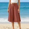 Stylish terracotta wide-leg culottes for women shown in a relaxed sunny beach setting - 3XL / Bottoms / Brick Red