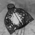 Detail showing splash pattern on temperature-sensitive waterproof techwear jacket - S / Tops / Black to Grey