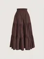 Detailed view of the layered texture and elastic waist of this plus-size brown tiered skirt. - S / Bottoms / Coffee