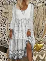 Detailed shot of a bohemian long-sleeved floral print maxi dress for women in light tones - S / Dresses / Gray