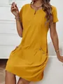 Detail view of a yellow cotton linen short sleeve dress with zipper neckline and pockets - Yellow