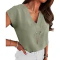 Detail view of an elegant women's V-neck sleeveless blouse in a sage green textured fabric. - Light Green