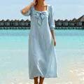 Elegant light blue cotton linen midi dress with a square neckline in a resort setting - S / Dresses / Blue