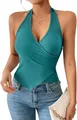 Front view detail showing a turquoise ribbed halter wrap top with an asymmetric cross hem. - S / Tops / Blue