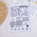 Detailed macro shot of a crinkle newspaper dog toy with printed articles and cartoons - Squeaky Newspaper / 18.5x26cm