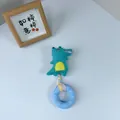 Dettaglio del gioco per animali coccodrillo in peluche con corda e anello da masticare - Ciambella in Striscia di Tessuto Coccodrillo / 20*9CM