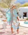 Back view of a bohemian floral printed chiffon beach cover-up in a sunny resort setting. - Tops / One Size / Light Blue