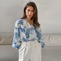 Elegant blue and white floral shirt with Chinese collar and lantern sleeves for women - S / Tops / Printing