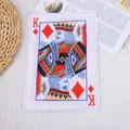 Macro view of a durable crinkle dog toy featuring a King of Diamonds playing card design - Squeaky Poker K / 18.5x26cm