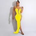 Detailed side view of a sexy yellow evening dress featuring rhinestones and mesh cutouts. - Yellow