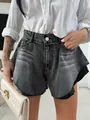 Trendy black high waisted washed denim shorts featuring ruffle bell hem and raw edges - S / Bottoms / Black and Gray