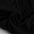 Close-up of the black breathable mesh fabric showing detailed texture and pleating. - S / Tops / 95% Nylon 5% Spandex