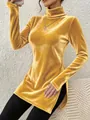 Detail view of gold velvet turtleneck top featuring a stylish side slit and slim fit - S / Tops / Gold