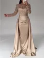 Détail d'une élégante robe de soirée champagne à paillettes avec manches longues et satin. - S / Robes / Champagne
