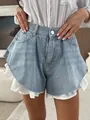 High-waist light blue denim shorts featuring a white ruffle hem and raw edges - S / Bottoms / Washed Light Blue